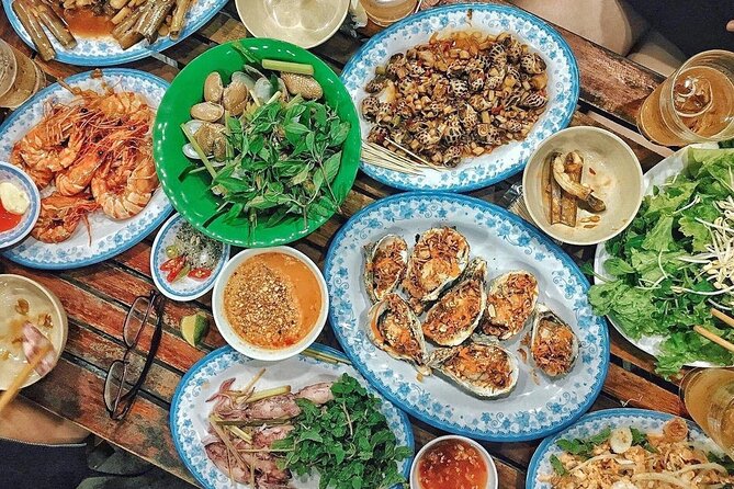 Da Nang By Night: Seafood dinner, night market and cruise trip - Bridge lights at Dragon Bridge, Han Bridge, and Love Bridge