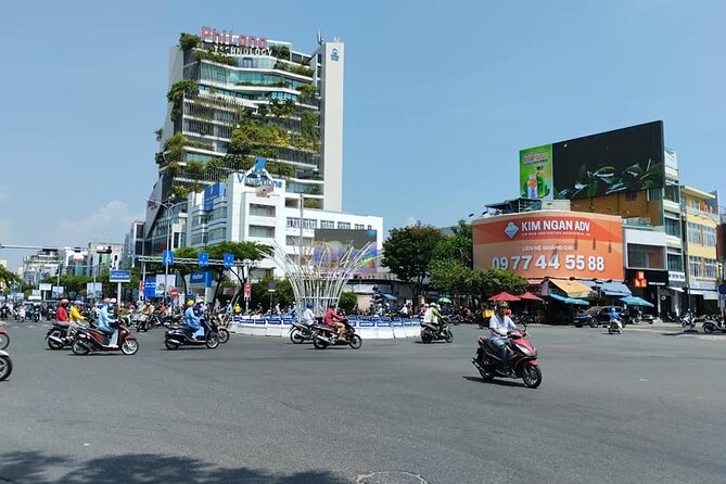 Da Nang Food Tour Motorbike & Sightseeing By Ao Dai Lady Rider - APEC Park and its kite-shaped design