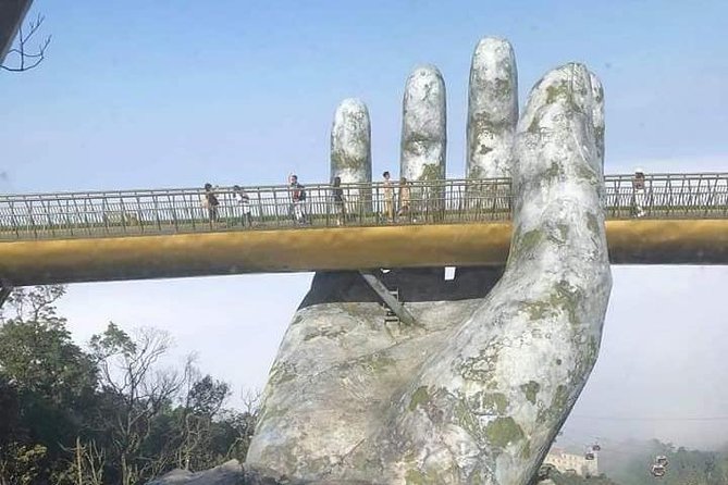 DaNang Fullday Tour-GOLDEN BRIDGE-MARBLE MOUNTAIN-MONKEY MOUNTAIN - Walking across the Golden Bridge
