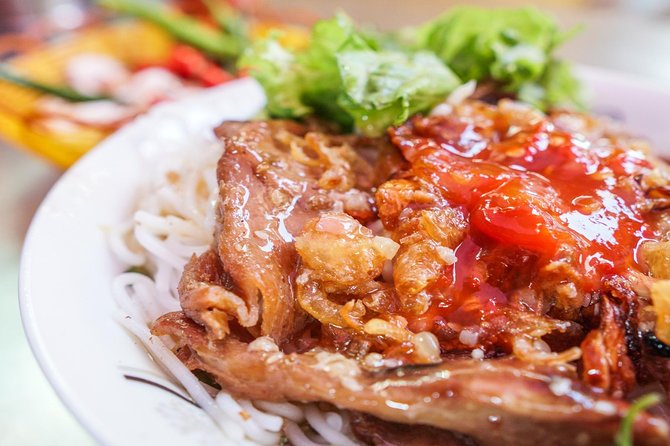 DaNang Night Foodie Tour-Sighseeing with Aodai Lady Rider Private - Key points at a glance