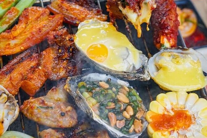 DaNang Night Foodie Tour-Sighseeing with Aodai Lady Rider Private - Street food, seafood, and the five or seven dish choice