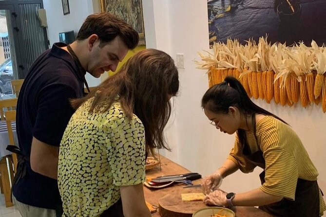 Happy Cooking Class in Danang - Mixing beef mango or papaya salad