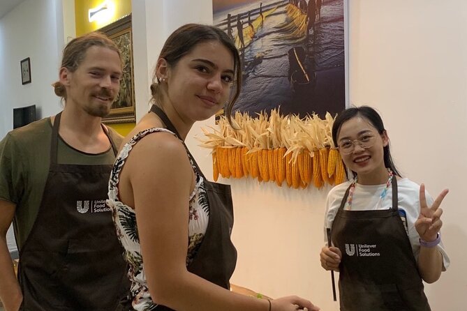 Happy Cooking Class in Danang - Sitting down to eat what you prepared