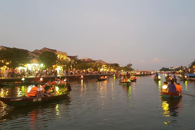 Hoi An Nightlife Tour with Hoi An Ancient Walking Tour, Boat Ride, Night Market - Walking through Hoi An Ancient Town