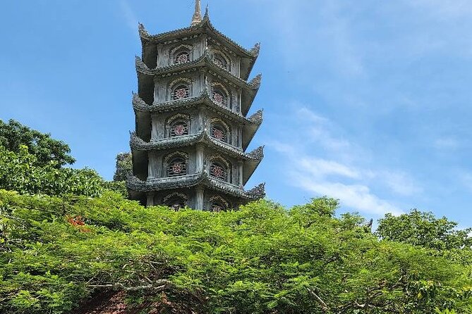 Lady Buddha statue- Marble Mountains- Coconut Jungle- Hoi An City - Local lunch before the afternoon activities