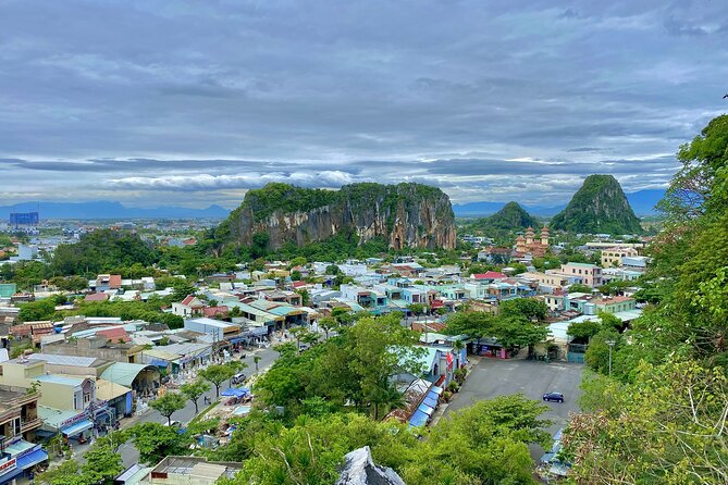 Marble Mountains, Coconut Forest & Hoi An Ancient Town Tour - Marble Mountains: caves, shrines, and steep stone steps