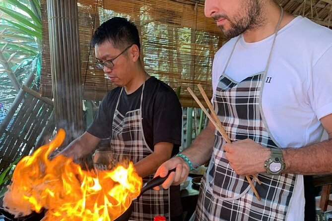 RICE PAPER Noodle Making Experience & Hoi An Cooking Class Class - Catching purple crabs before lunch